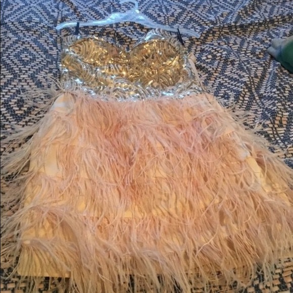 bebe Dresses & Skirts - Bebe feather dress